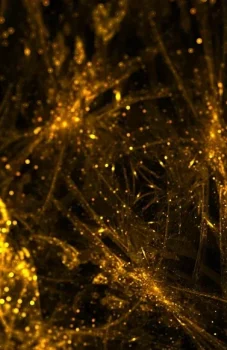 Fine gold sparks branching through darkness